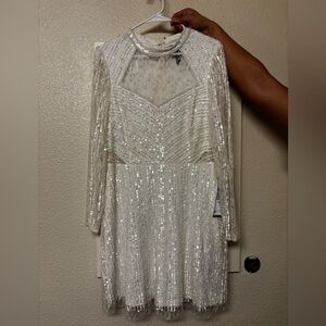 Adrianna Papell white beaded illusion dress.